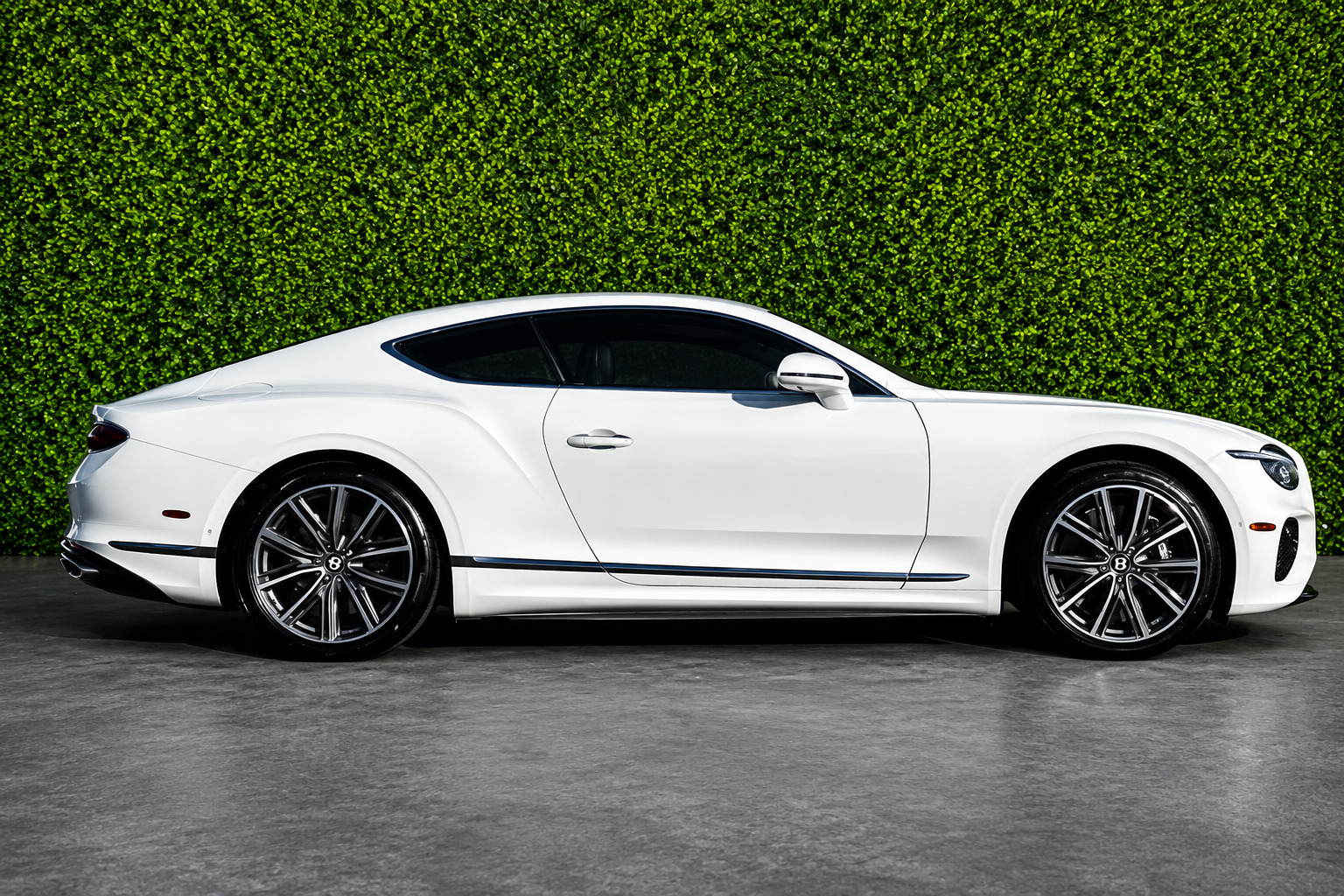 Chauffeured Bentley Flying Spur executing private executive travel in London